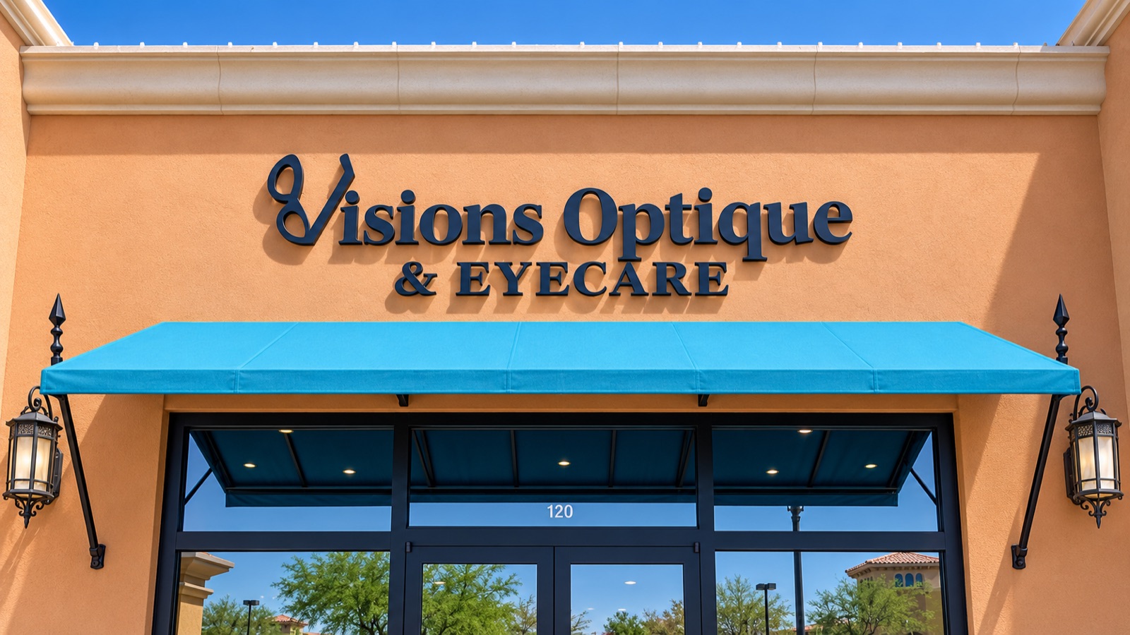 Storefront of Visions Optique & Eyecare at 18291 N Pima Road, Suite 120 — navy lettering above a turquoise awning and glass entry doors.