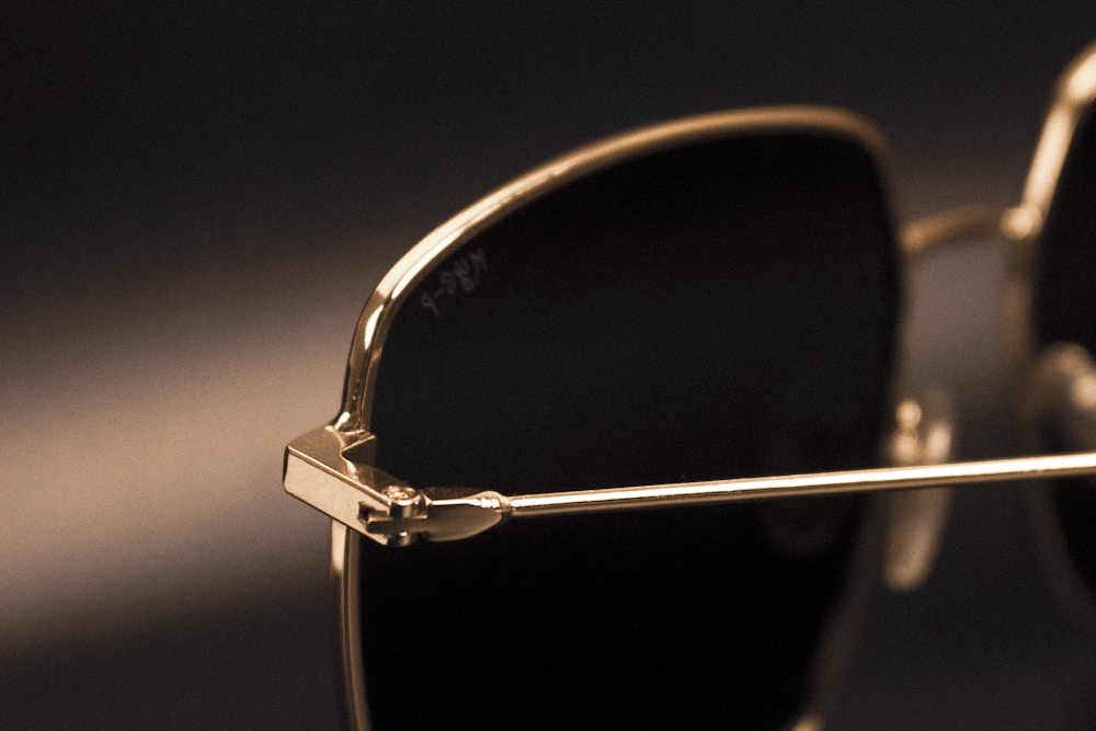 Gold luxury prescription sunglasses — designer sunglasses at Visions Optique & Eyecare Scottsdale