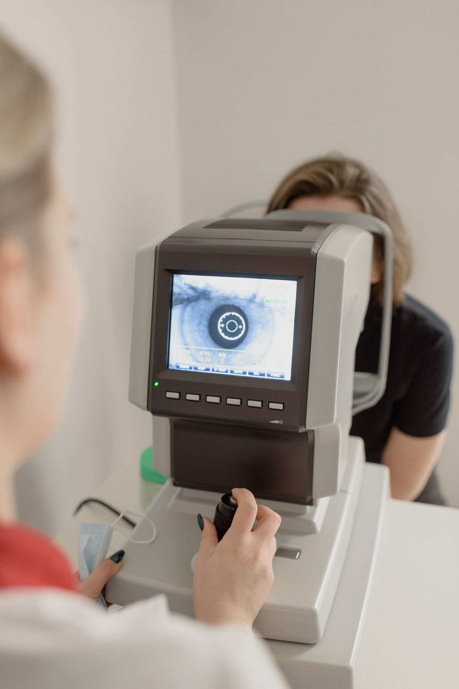 Retinal imaging scan displayed on clinical equipment during a diabetic eye exam at Visions Optique & Eyecare, North Scottsdale